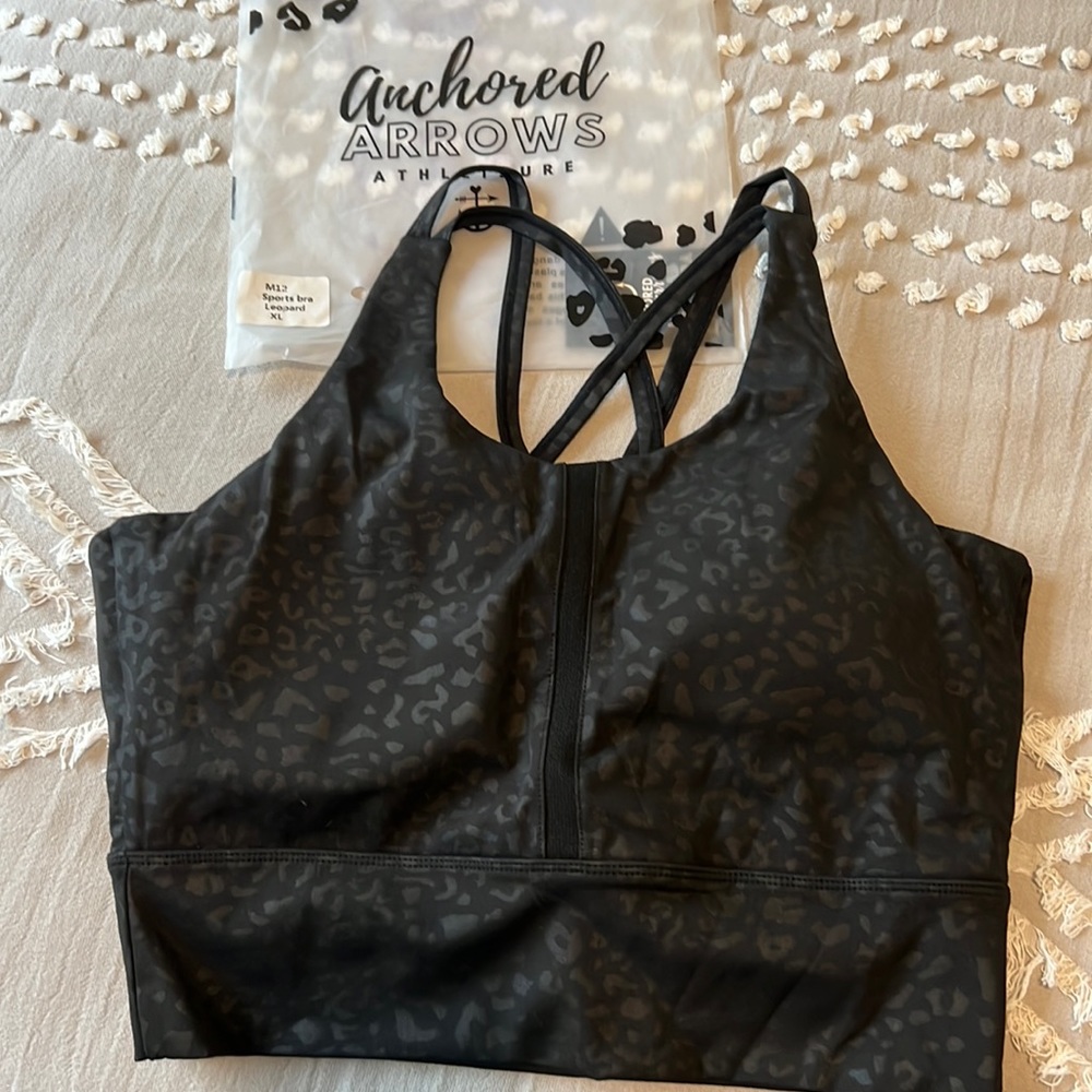Anchored arrows leopard sports bra
